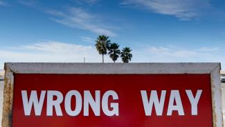 red and white stop sign by Kind and Curious courtesy of Unsplash.