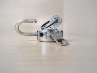 gray stainless steel padlock by Basil James courtesy of Unsplash.