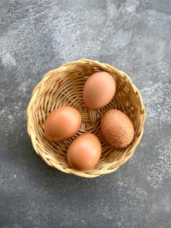 brown eggs in brown woven basket by Ash Hayes courtesy of Unsplash.