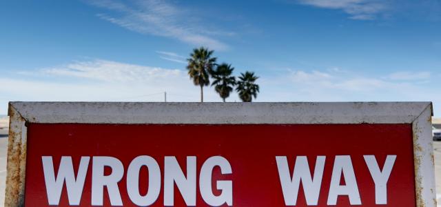 red and white stop sign by Kind and Curious courtesy of Unsplash.